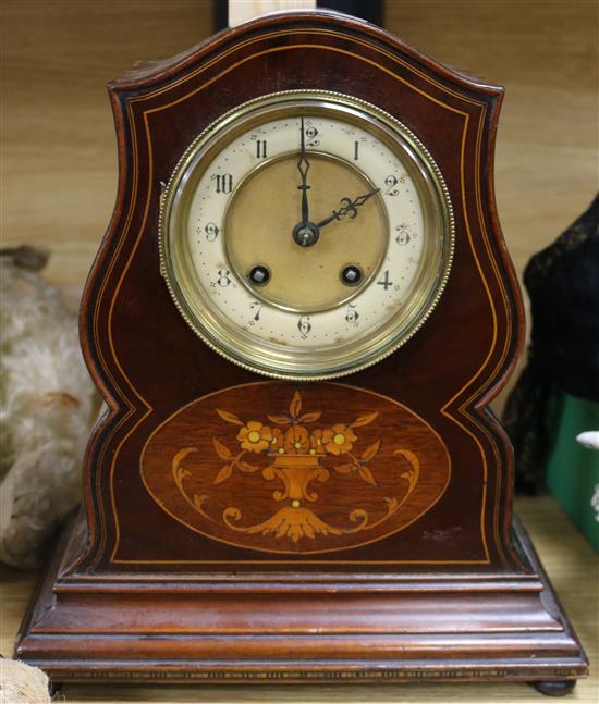 A mahogany mantel clock